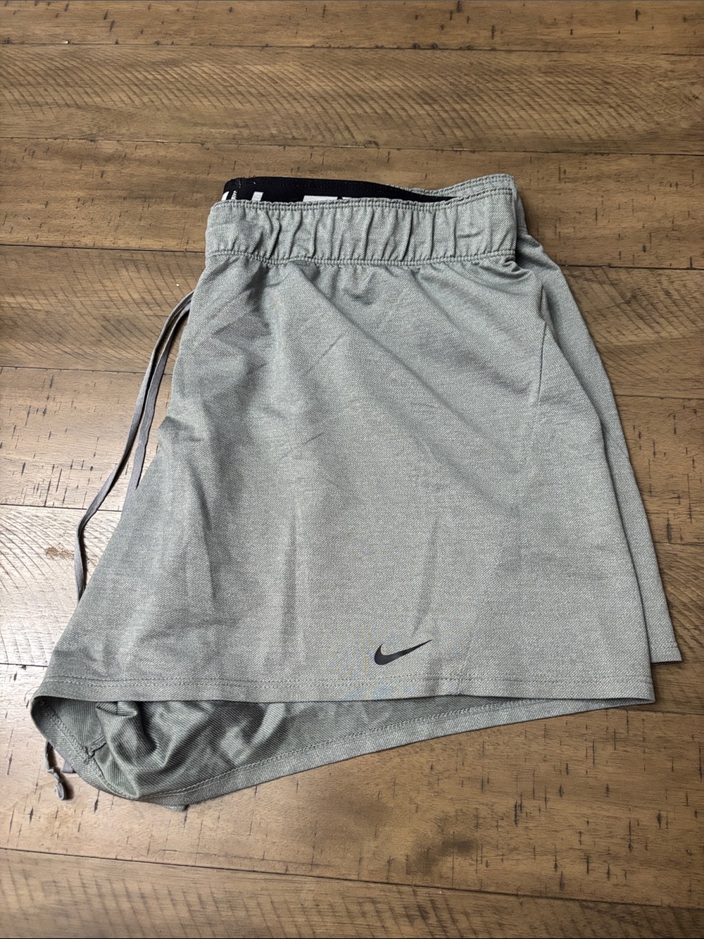 Nike Men’s Athletic Shorts in grey with Black Swoosh